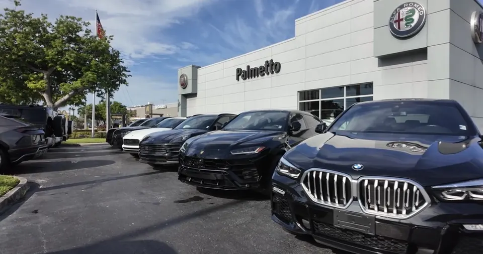 Showroom Dust Free Corp cleaning dealership vehicles in Miami